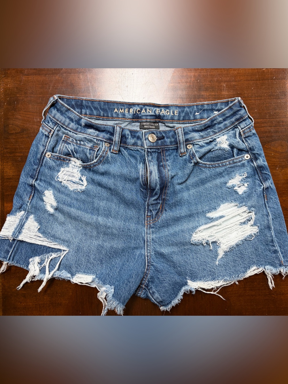 American Eagle Light Blue Denim Shorts with Brown Stitching